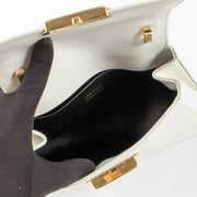 shop this authentic Prada White Brushed Leather Triangle Shoulder bag pre-loved on Labellov.com