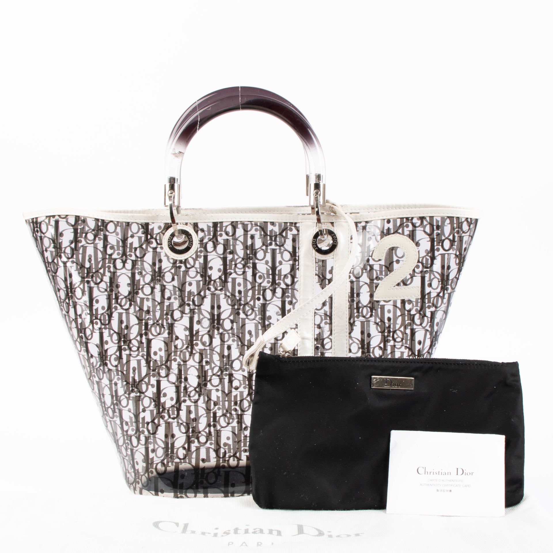 Shop the authentic Christian Dior by John Galliano Black Oblique PVC Basket Bag second hand on Labellov.com