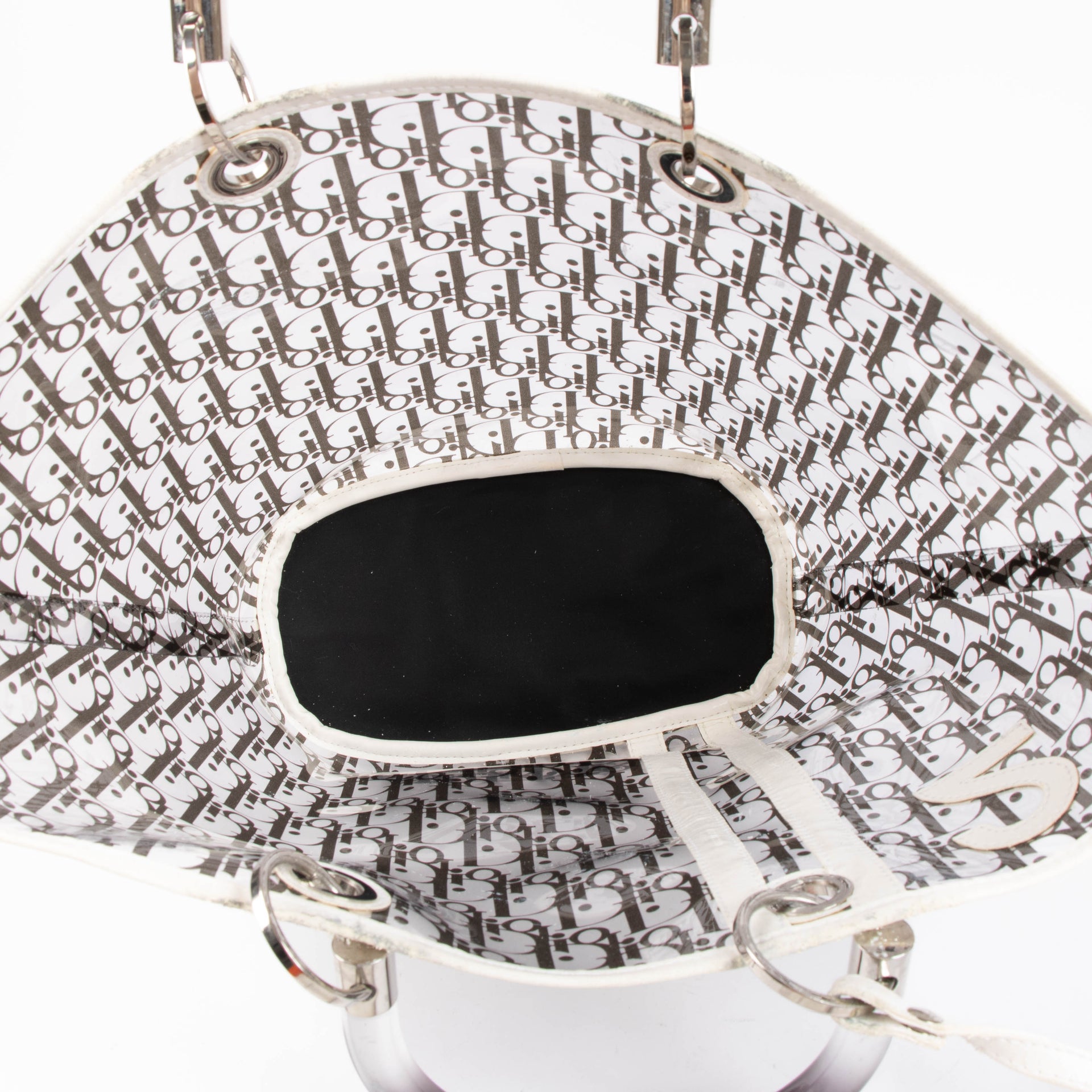 Shop the authentic Christian Dior by John Galliano Black Oblique PVC Basket Bag second hand on Labellov.com