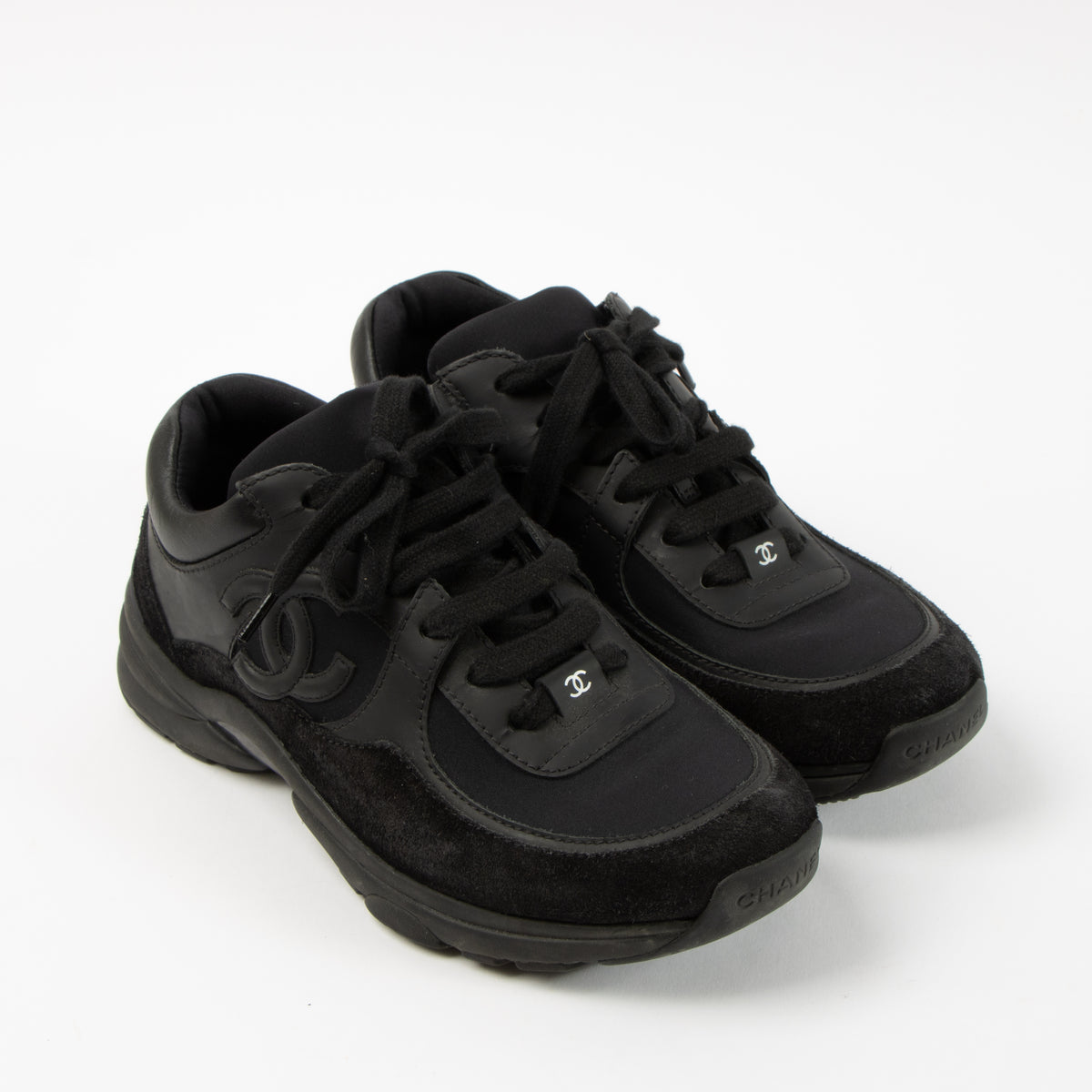 Shop this authentic Chanel Black Sneakers Size 37  pre-loved on Labellov.com 