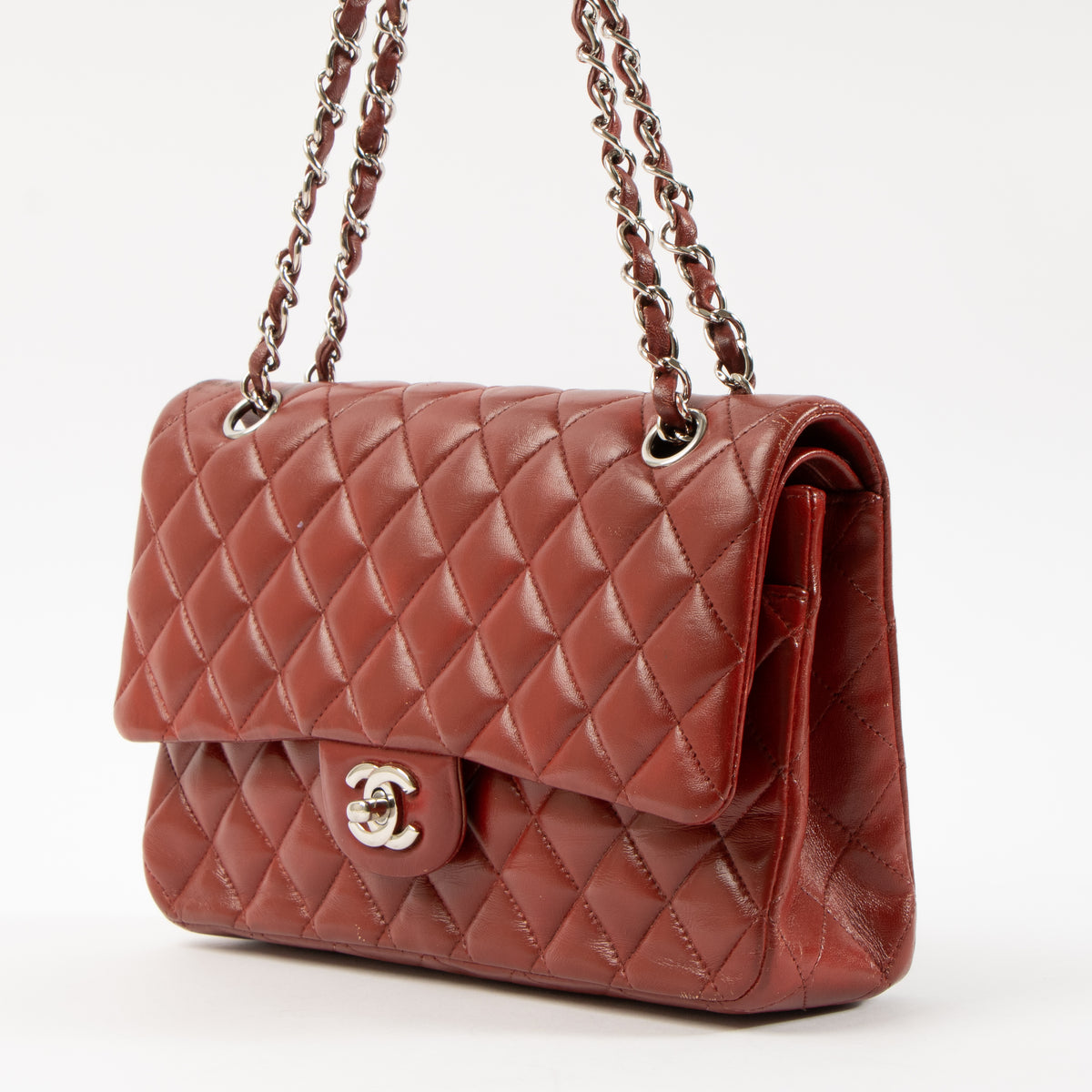 Shop this authentic Chanel Red Lambskin Medium Classic 11.12 Handbag pre-loved on Labellov.com