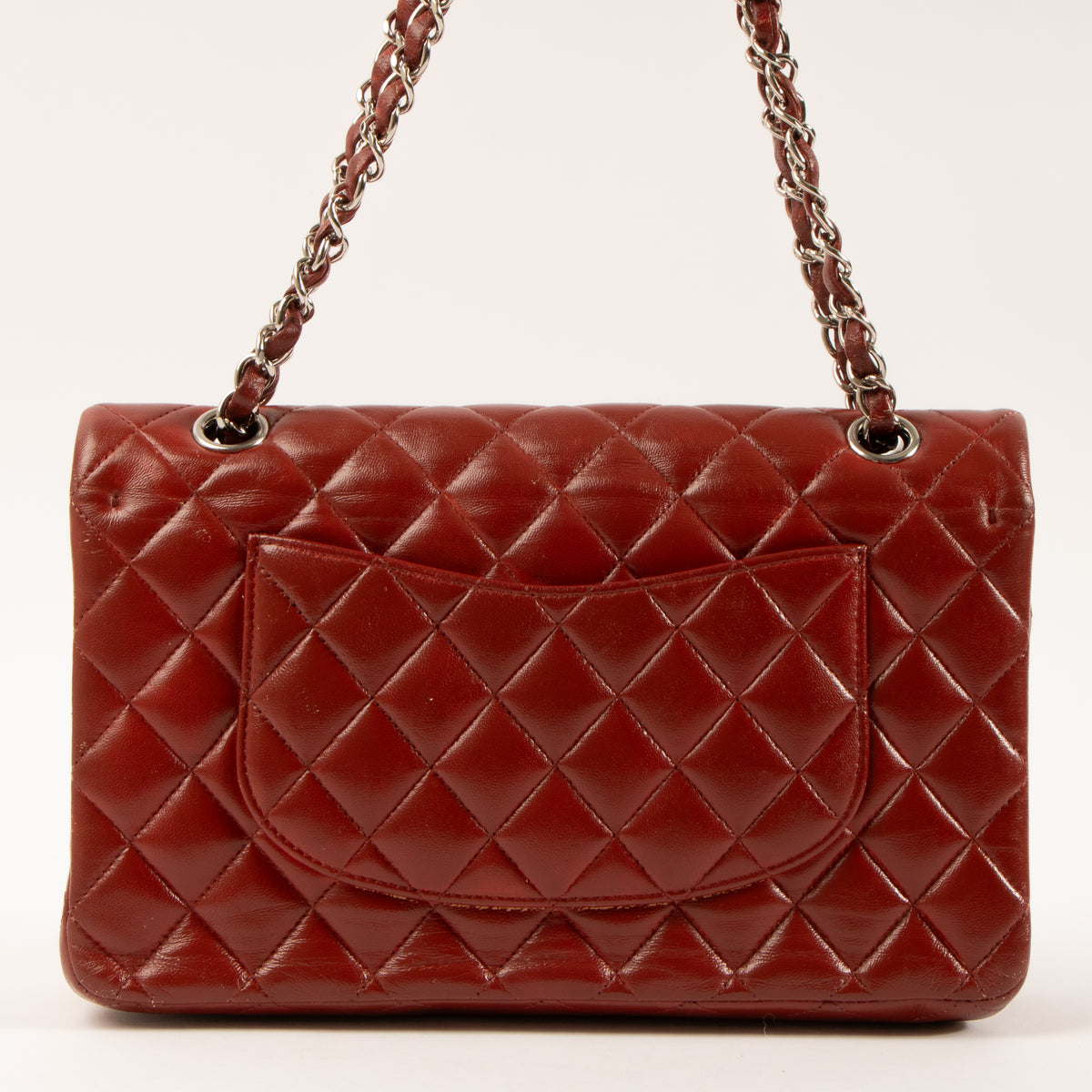 Shop this authentic Chanel Red Lambskin Medium Classic 11.12 Handbag pre-loved on Labellov.com