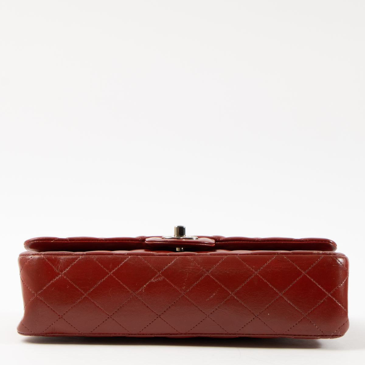 Shop this authentic Chanel Red Lambskin Medium Classic 11.12 Handbag pre-loved on Labellov.com