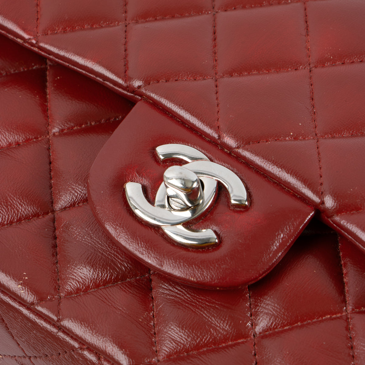 Shop this authentic Chanel Red Lambskin Medium Classic 11.12 Handbag pre-loved on Labellov.com