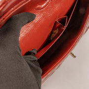 Shop this authentic Chanel Red Lambskin Medium Classic 11.12 Handbag pre-loved on Labellov.com