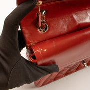 Shop this authentic Chanel Red Lambskin Medium Classic 11.12 Handbag pre-loved on Labellov.com