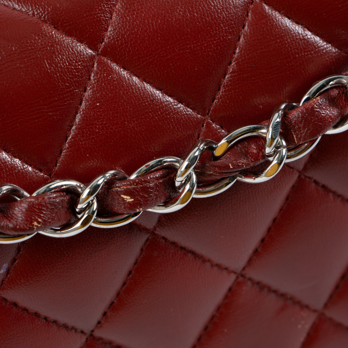 Shop this authentic Chanel Red Lambskin Medium Classic 11.12 Handbag pre-loved on Labellov.com