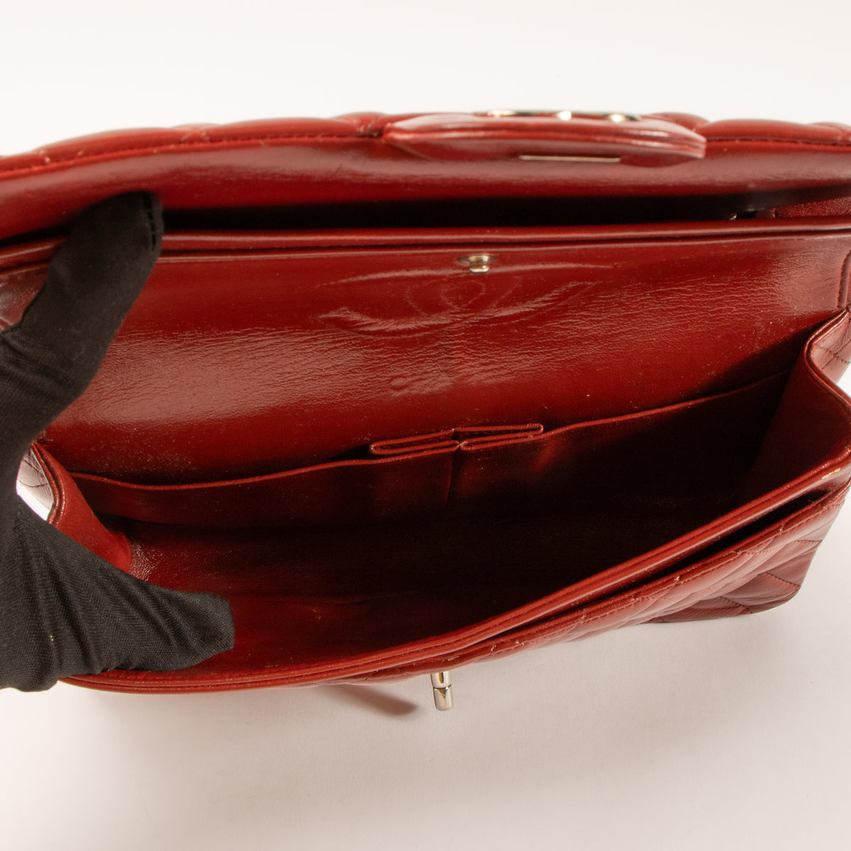 Shop this authentic Chanel Red Lambskin Medium Classic 11.12 Handbag pre-loved on Labellov.com