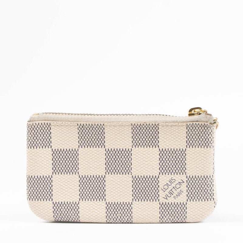 Shop this 100% authentic Louis Vuitton Damier Ebene Coin Purse at Labellov.com