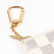 Shop this 100% authentic Louis Vuitton Damier Ebene Coin Purse at Labellov.com