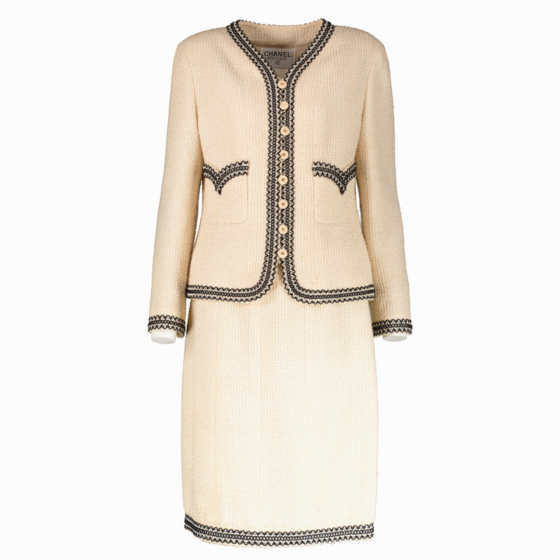 Shop this 100% authentic Chanel 94P Beige Tweed Jacket/Skirt Set at Labellov.com