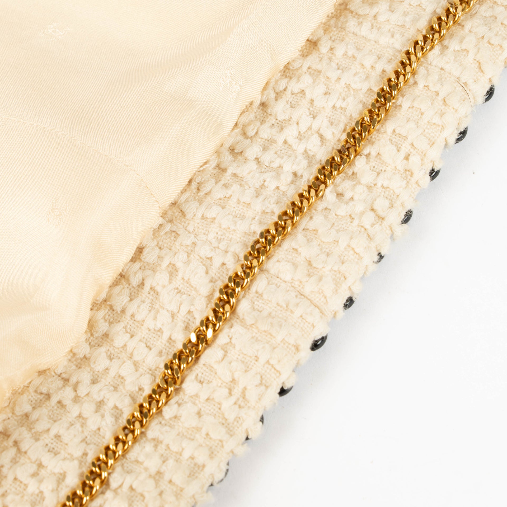 Shop this 100% authentic Chanel 94P Beige Tweed Jacket/Skirt Set at Labellov.com