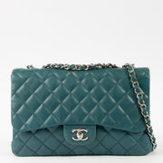 Shop this authentic luxury Chanel Teal Lambskin Large/Jumbo Classic Single Flap Bag pre-loved on Labellov.com