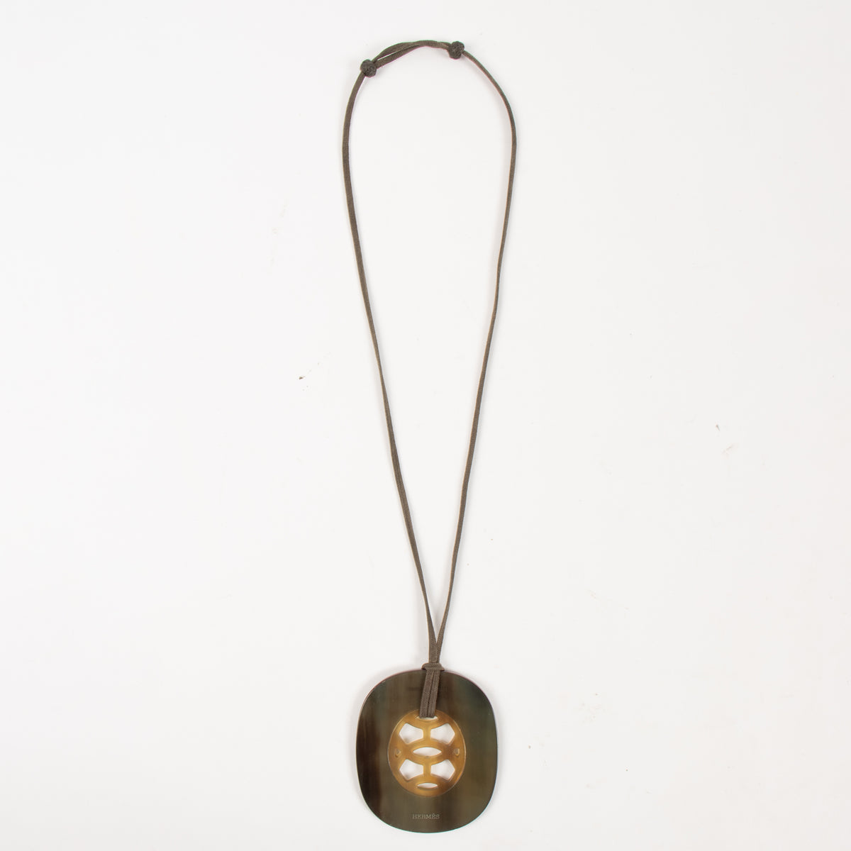Shop this authentic  Hermes Burgundy Buffalo Horn Lift Necklace pre-loved on Labellov.com