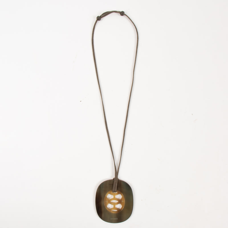 Shop this authentic  Hermes Burgundy Buffalo Horn Lift Necklace pre-loved on Labellov.com