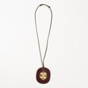 Shop this authentic  Hermes Burgundy Buffalo Horn Lift Necklace pre-loved on Labellov.com