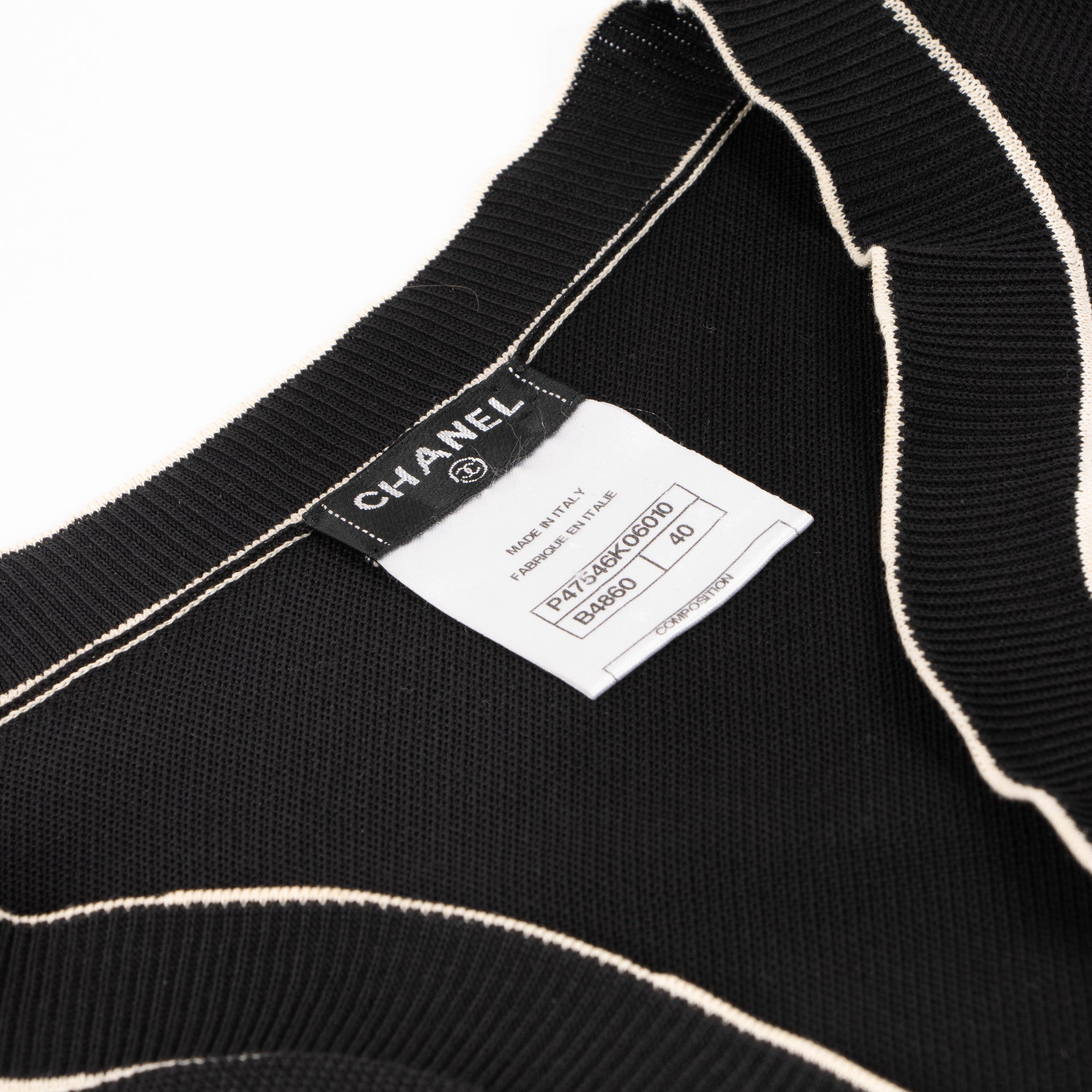 Shop this authentic Chanel Ribbed Knit Coco Mark Short Sleeve Top pre-loved on Labellov.com 