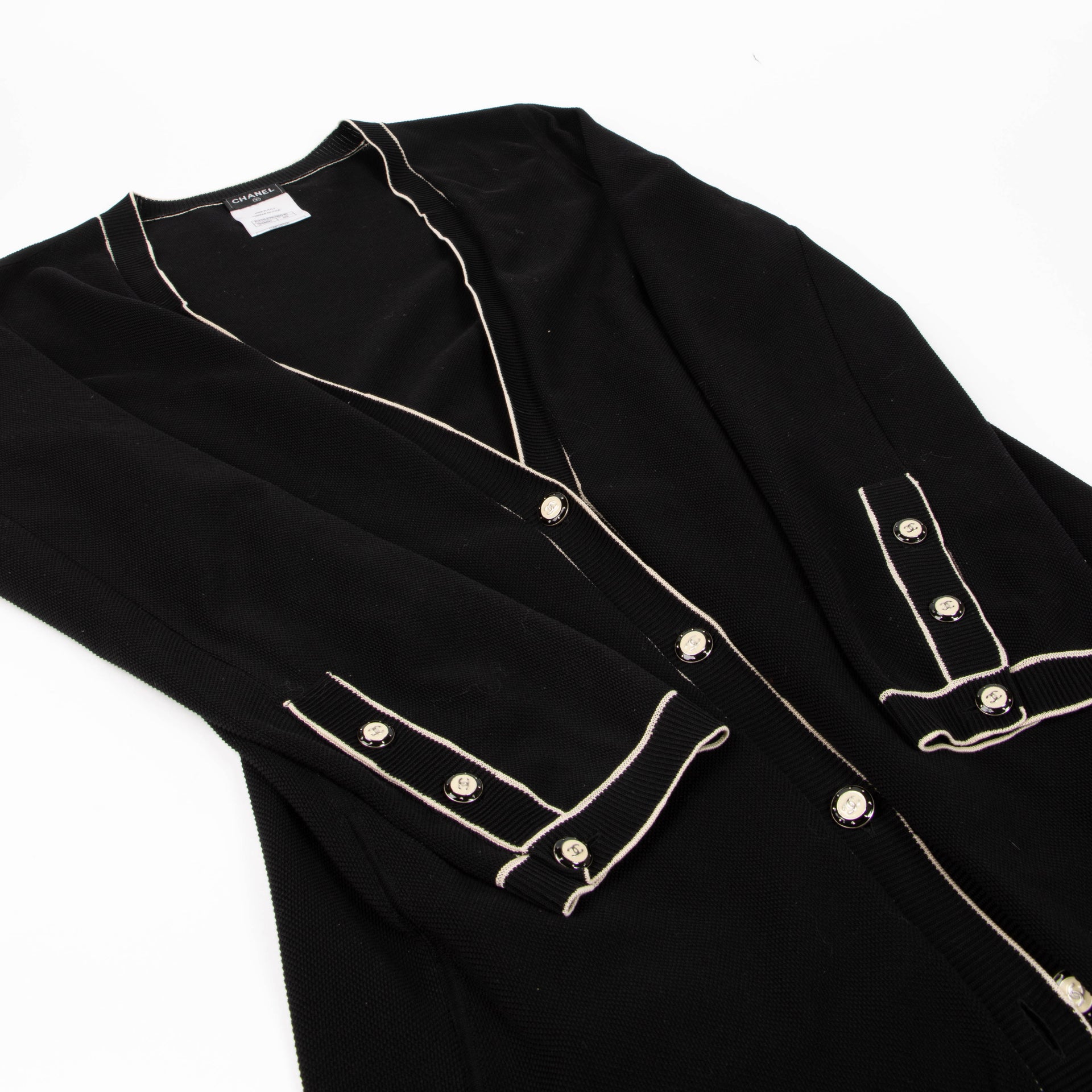 Shop this authentic Chanel Ribbed Knit Coco Mark Cardigan - size 40  pre-loved on Labellov.com 