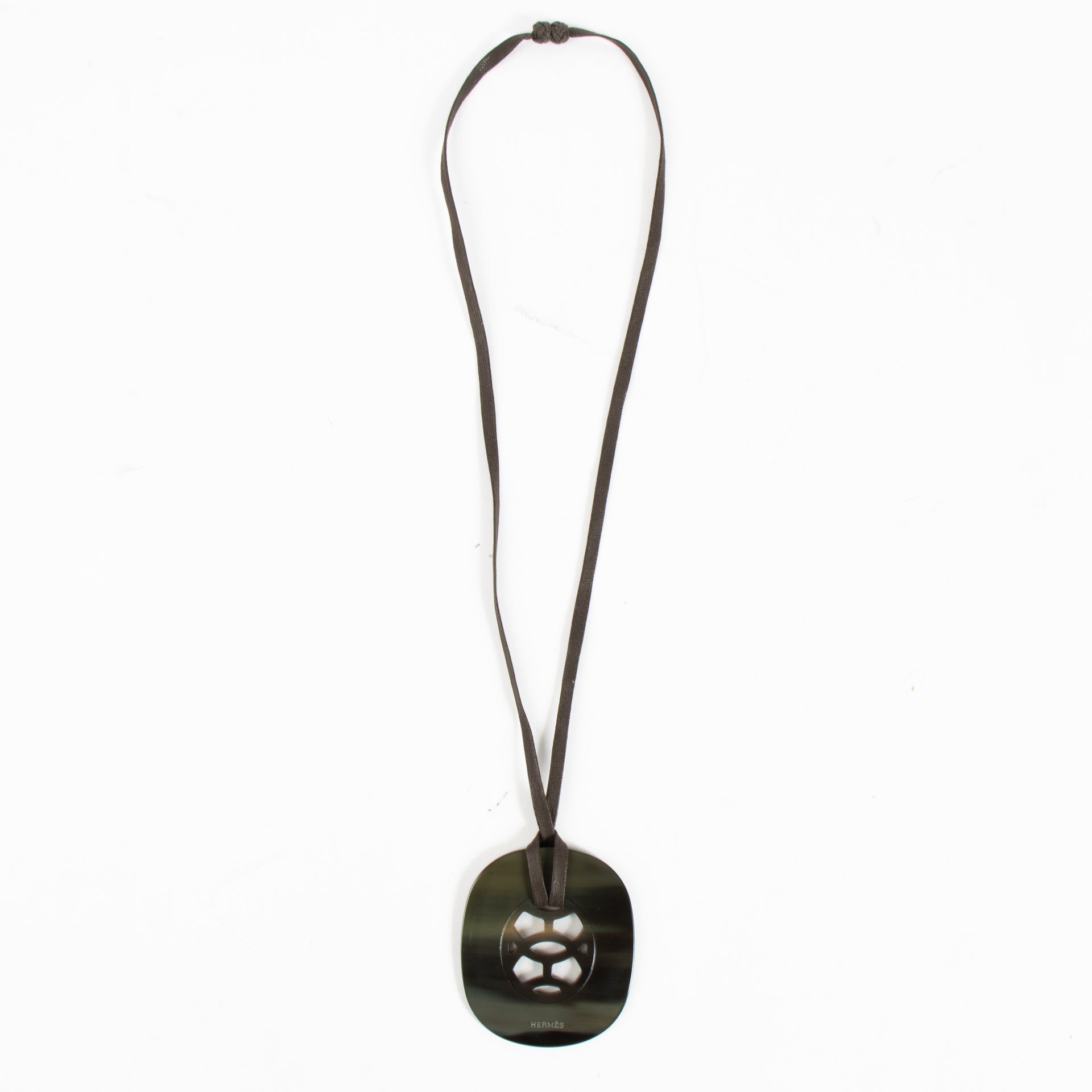 Shop authentic Hermès Buffalo Horn Lift Pendant Necklace on Labellov.com.
