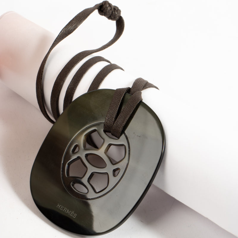 Shop authentic Hermès Buffalo Horn Lift Pendant Necklace on Labellov.com.
