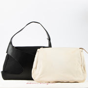 Shop this authentic Ferragamo Black Cut-Out Hobo Bag Pre-loved on Labellov.com