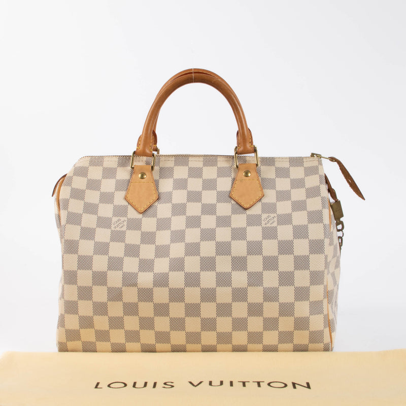 Shop this authentic Louis Vuitton Damier Azur Speedy 30 pre-loved on Labellov.com