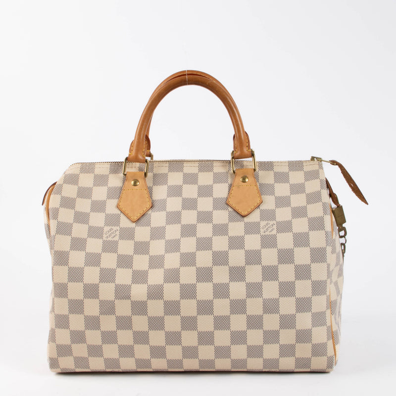 Shop this authentic Louis Vuitton Damier Azur Speedy 30 pre-loved on Labellov.com