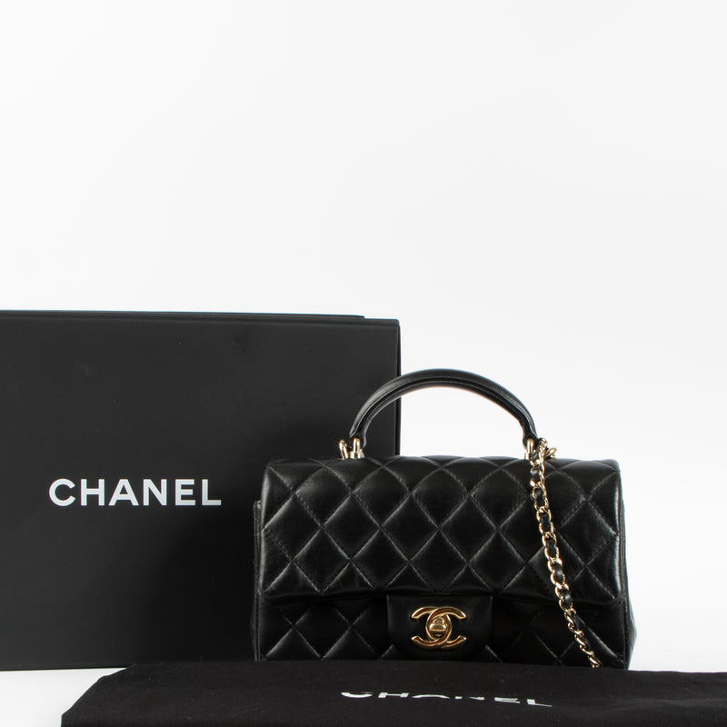 Shop this authentic Chanel Black Lambskin Mini Classic Bag with Handle pre-loved on Labellov.com