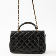 Shop this authentic Chanel Black Lambskin Mini Classic Bag with Handle pre-loved on Labellov.com