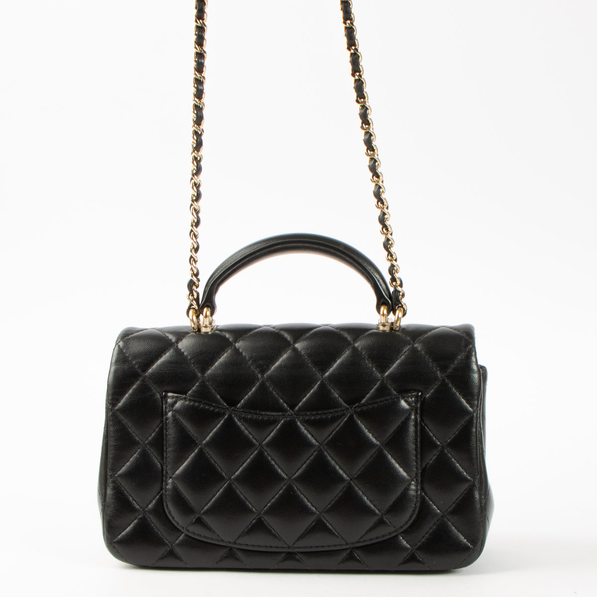 Shop this authentic Chanel Black Lambskin Mini Classic Bag with Handle pre-loved on Labellov.com