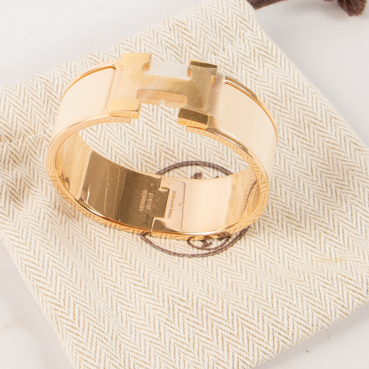 Shop this authentic Hermes Creme Clic Clac H Bracelet Pre-Loved on Labellov.com