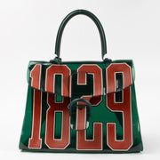 Shop this authentic Delvaux Green Vinyl Brillant The Hero Bag pre-loved on Labellov.com