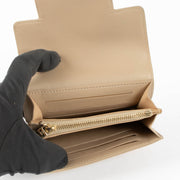 Shop this 100% authentic Delvaux Gris Tourterelle Madame Compact Wallet at Labellov.com