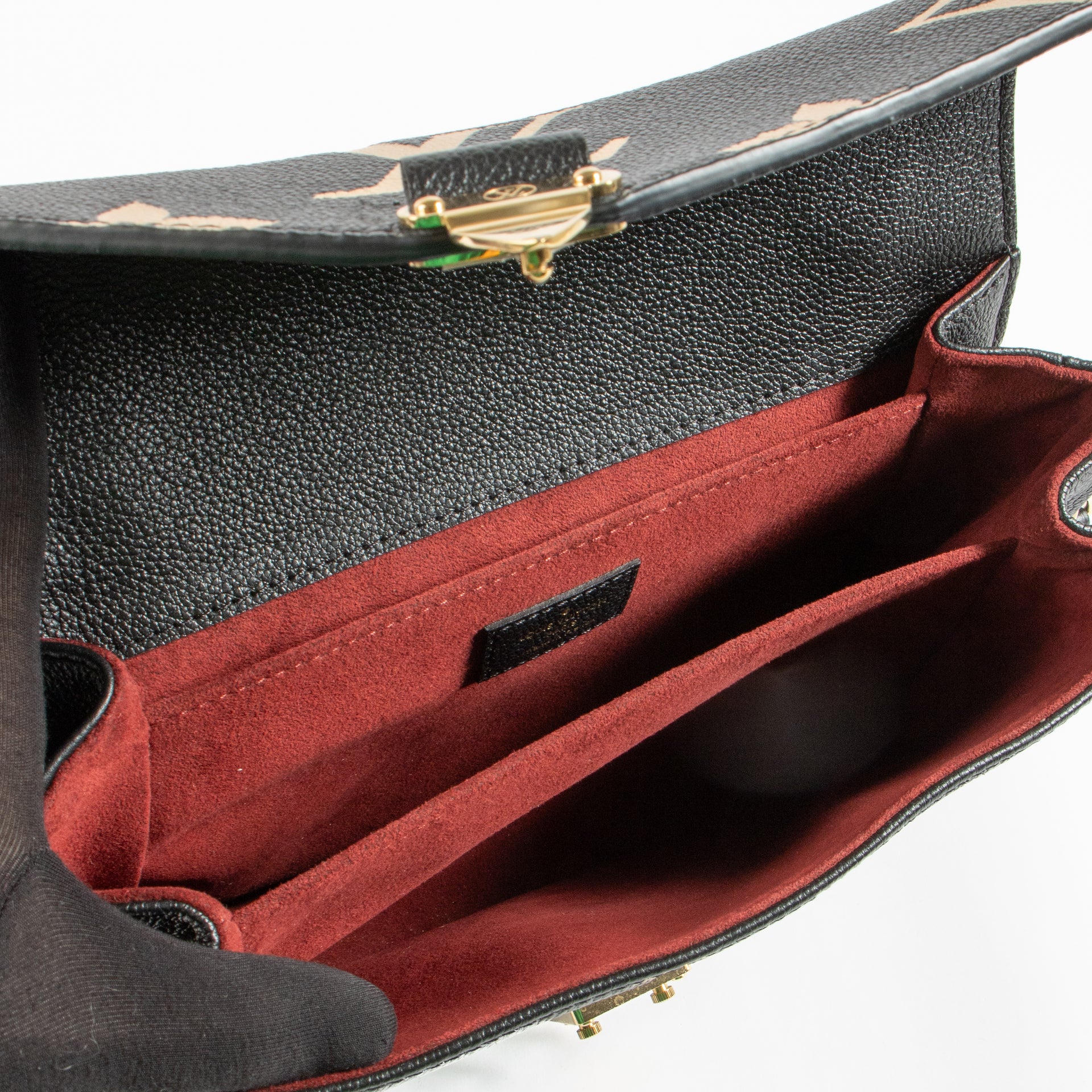 Shop the authentic Louis Vuitton Black Monogram Empreinte Pochette Métis Bag on Labellov.com !