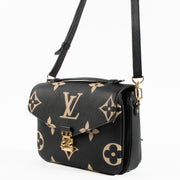 Shop the authentic Louis Vuitton Black Monogram Empreinte Pochette Métis Bag on Labellov.com !