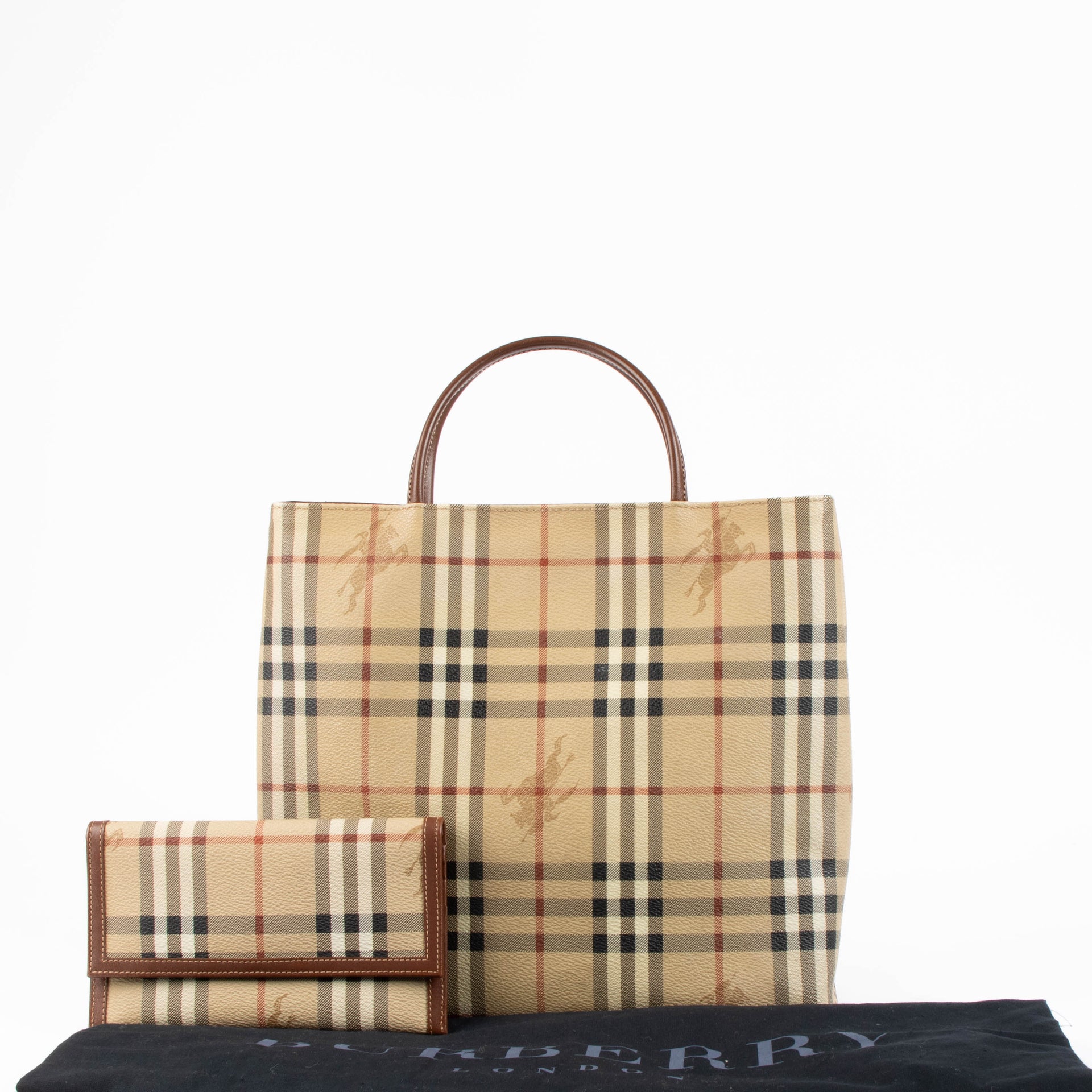 Shop this authentic Burberry Check Canvas Top Handle + Wallet pre-loved on Labellov.com