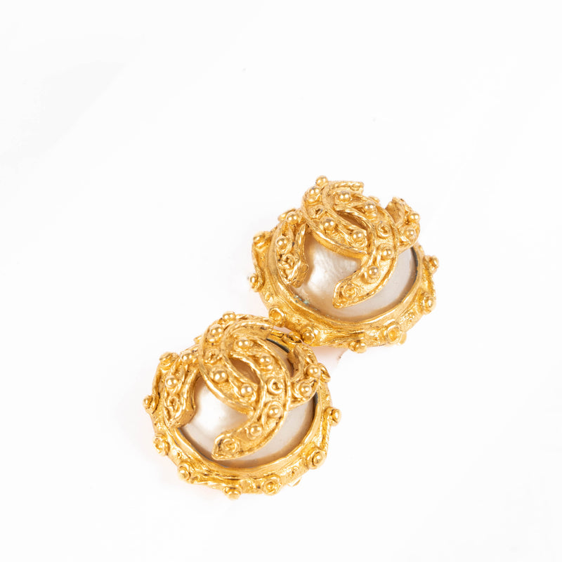 Shop these authentic Chanel 91A Gold Vintage CC Fantasy Pearl Clip-On Earrings pre-loved on Labellov.com