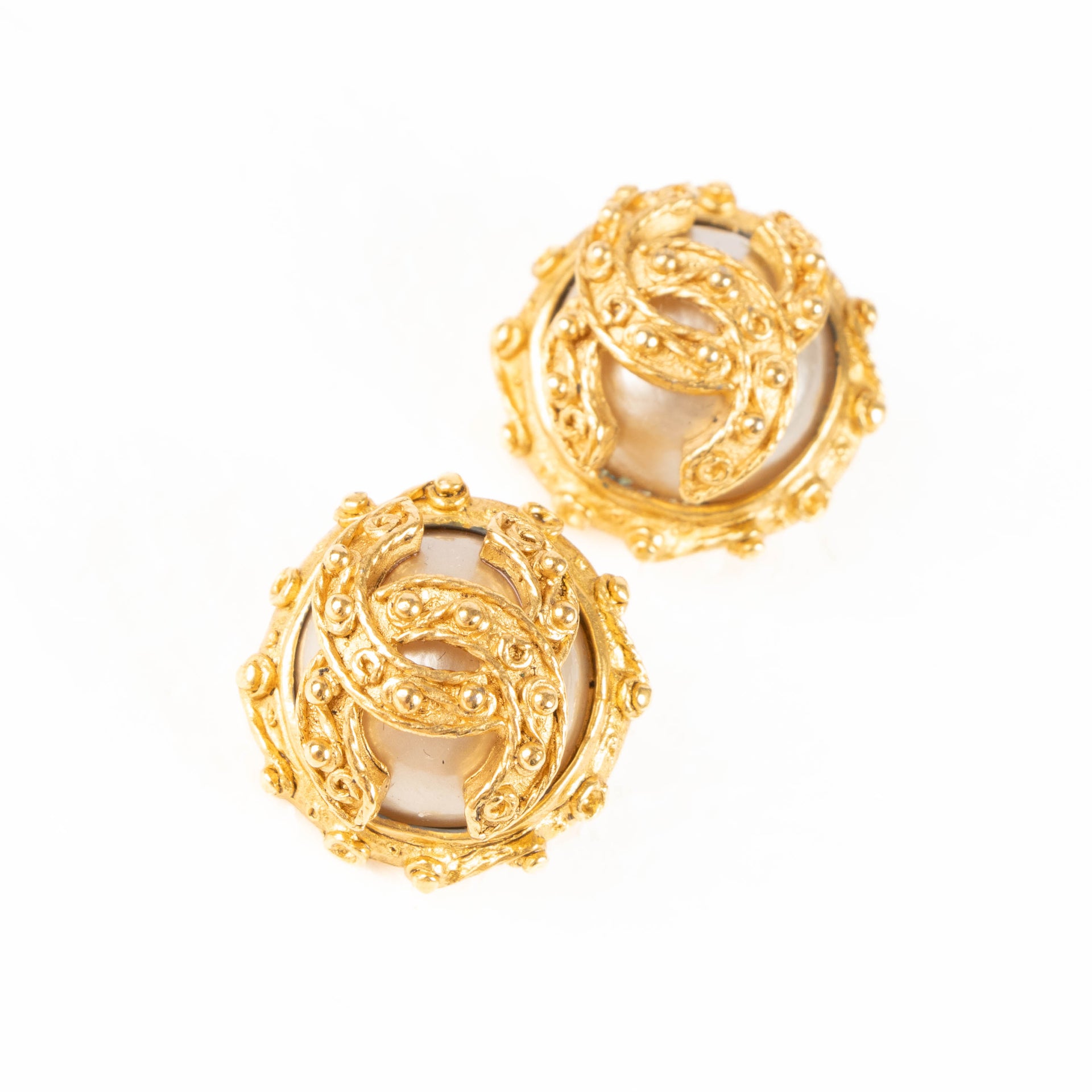 Shop these authentic Chanel 91A Gold Vintage CC Fantasy Pearl Clip-On Earrings pre-loved on Labellov.com