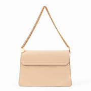Shop authentic Givenchy Beige GV3 Small Shoulder Bag on Labellov.com.