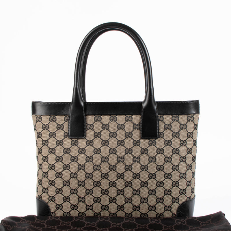 Shop this authentic Gucci Blue Monogram Vintage Top handle pre-loved on Labellov.com