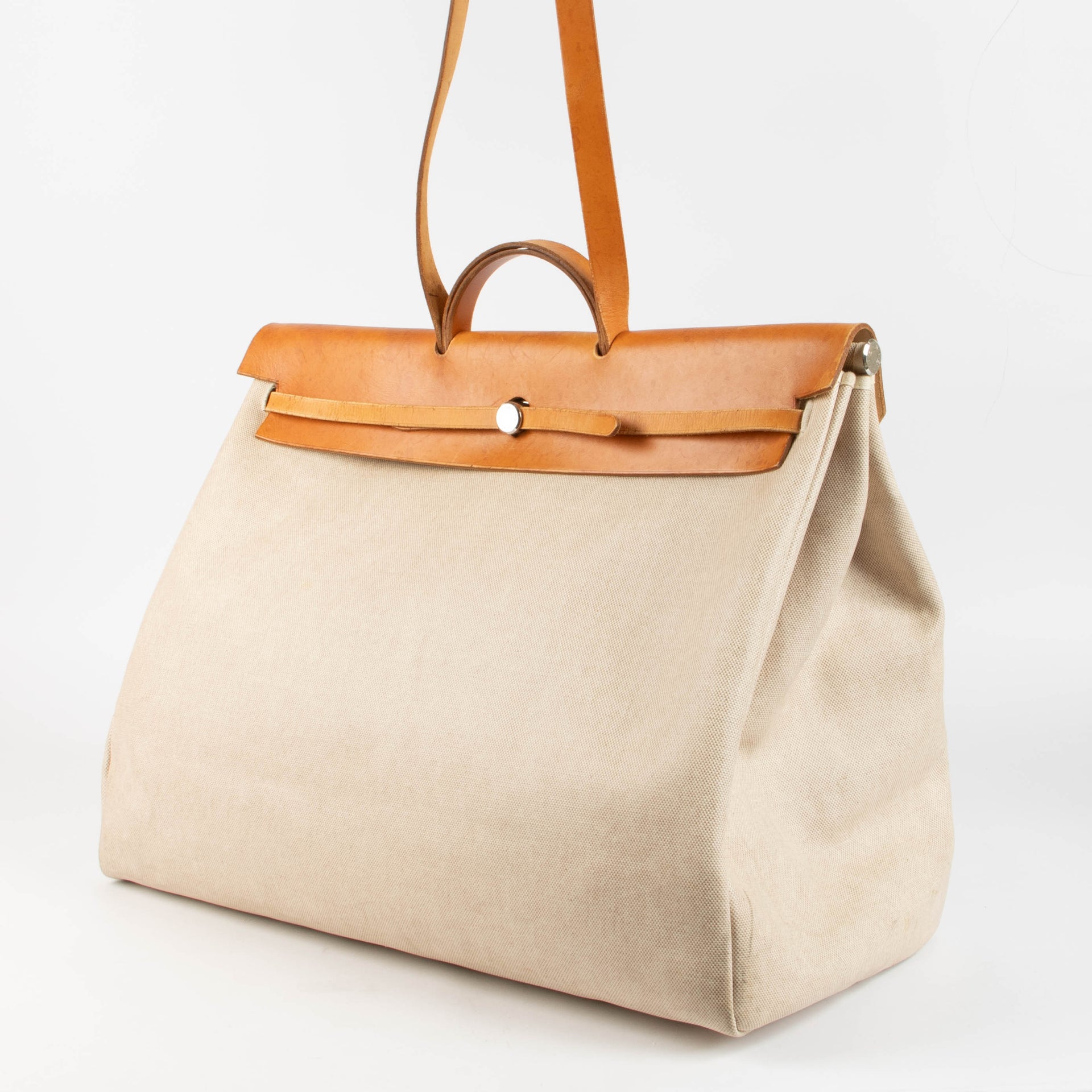 Shop this 100% authentic Hermès Herbag Cabine Canvas/Leather Travel Bag at Labellov.com