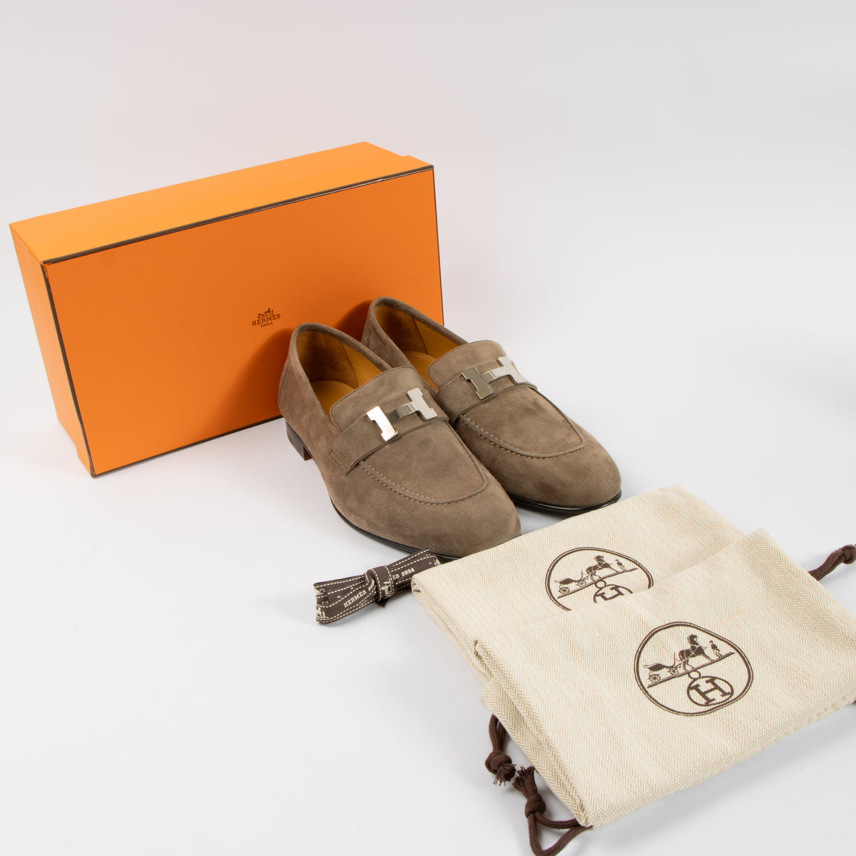 Shop the authentic Hermes Etoupe Suede Honore Loafers on Labellov.com.