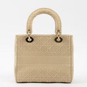 Shop this authentic luxury Christian Dior Beige Canvas Medium Lady D-Lite Bag pre-loved on Labellov.com