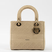 Shop this authentic luxury Christian Dior Beige Canvas Medium Lady D-Lite Bag pre-loved on Labellov.com