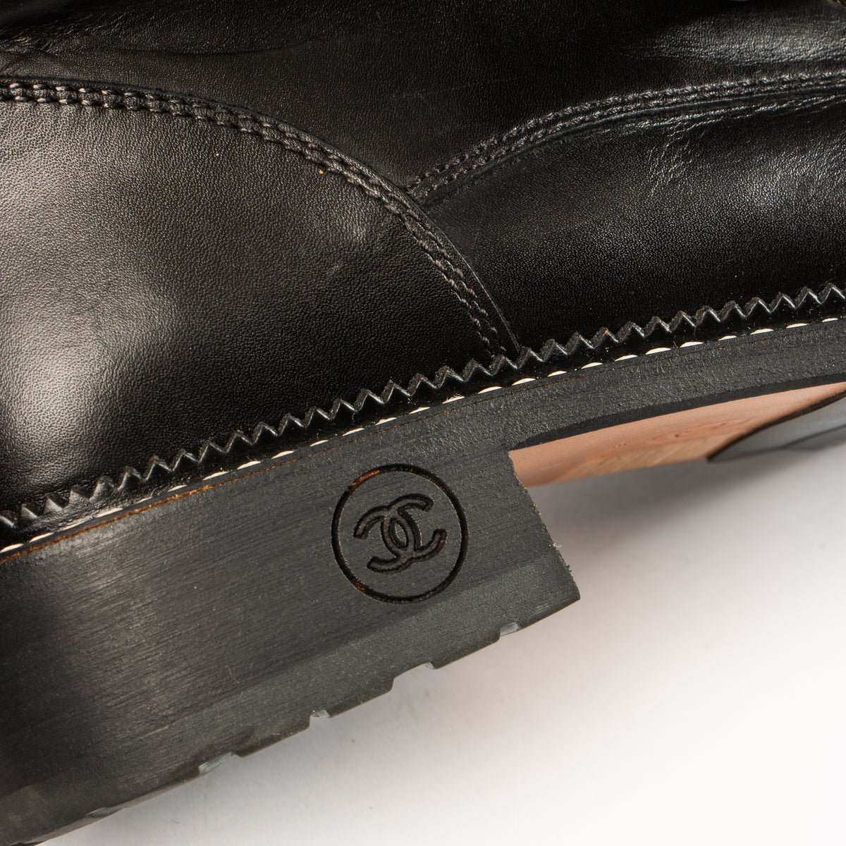 Shop this authentic Chanel 15A Black Combat Boots Size - 39 Pre-Loved on Labellov.com