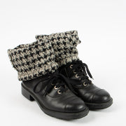 Shop this authentic Chanel 11A Paris-Byzance Black Houndstooth Tweed Sock Leather Boots Pre-Loved on Labellov.com