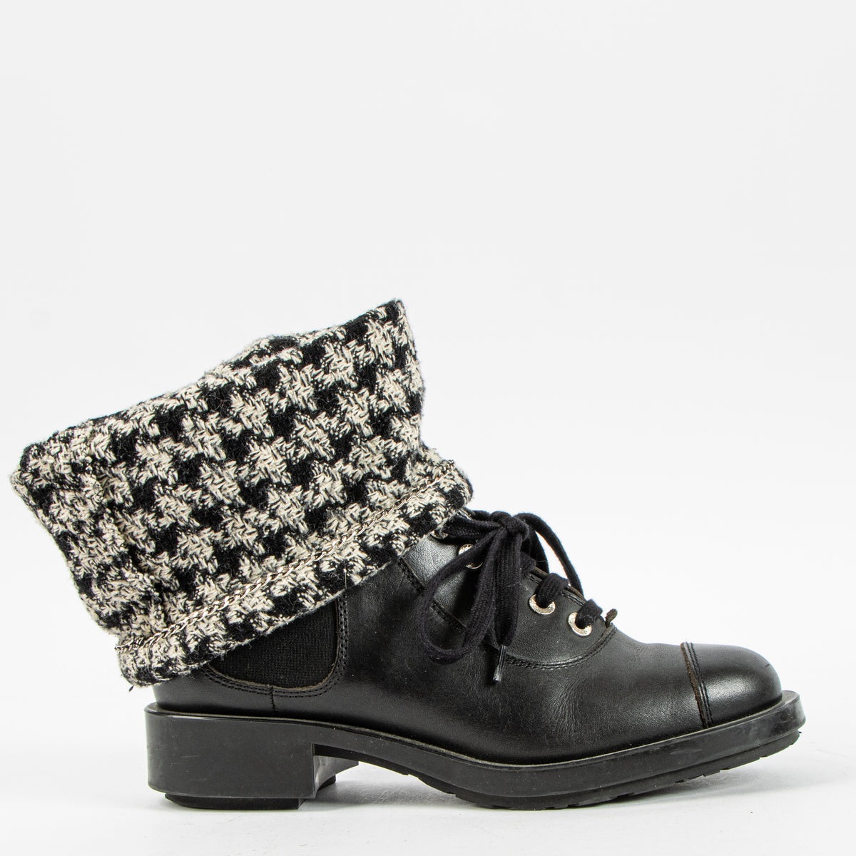 Shop this authentic Chanel 11A Paris-Byzance Black Houndstooth Tweed Sock Leather Boots Pre-Loved on Labellov.com