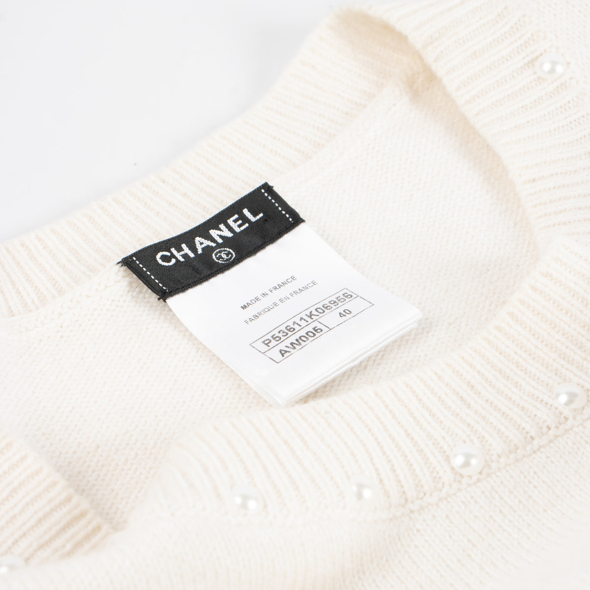Shop this authentic Chanel Cream Pearl Embellished Sweater pre-loved on Labellov.com