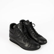 Shop this 100% authentic Chanel Black Sneakers – Size 38.5 at Labellov.com