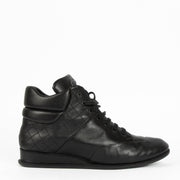 Shop this 100% authentic Chanel Black Sneakers – Size 38.5 at Labellov.com